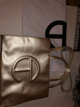 Load image into Gallery viewer, Telfar Shopping Bag in Gold
